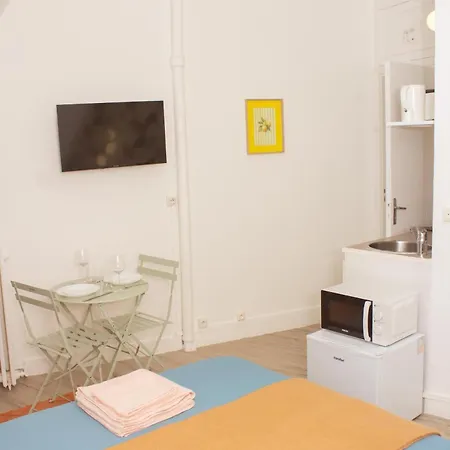 Place Equipe Au Coeur De Avec Vue Sur L'arc De Triomphe Et La Tour Eiffel Homestay *